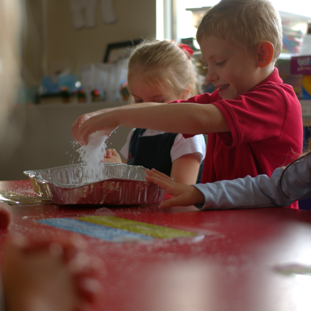 Boy and Girl Christian Preschool Students Learning Together